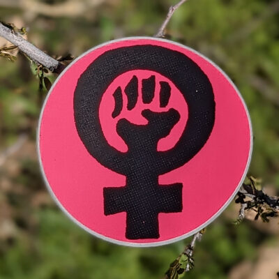 feminist fist round sticker