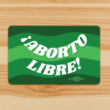 Rectangle sticker with a green color pallet background. White text across the sticker says "¡Aborto Libre!" A union bug sits on the bottom right.